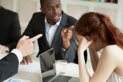 men bullying female coworker, Studio City gender discrimination lawyer concept